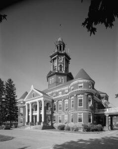 A black and white historic photo of Polk Center's main building.